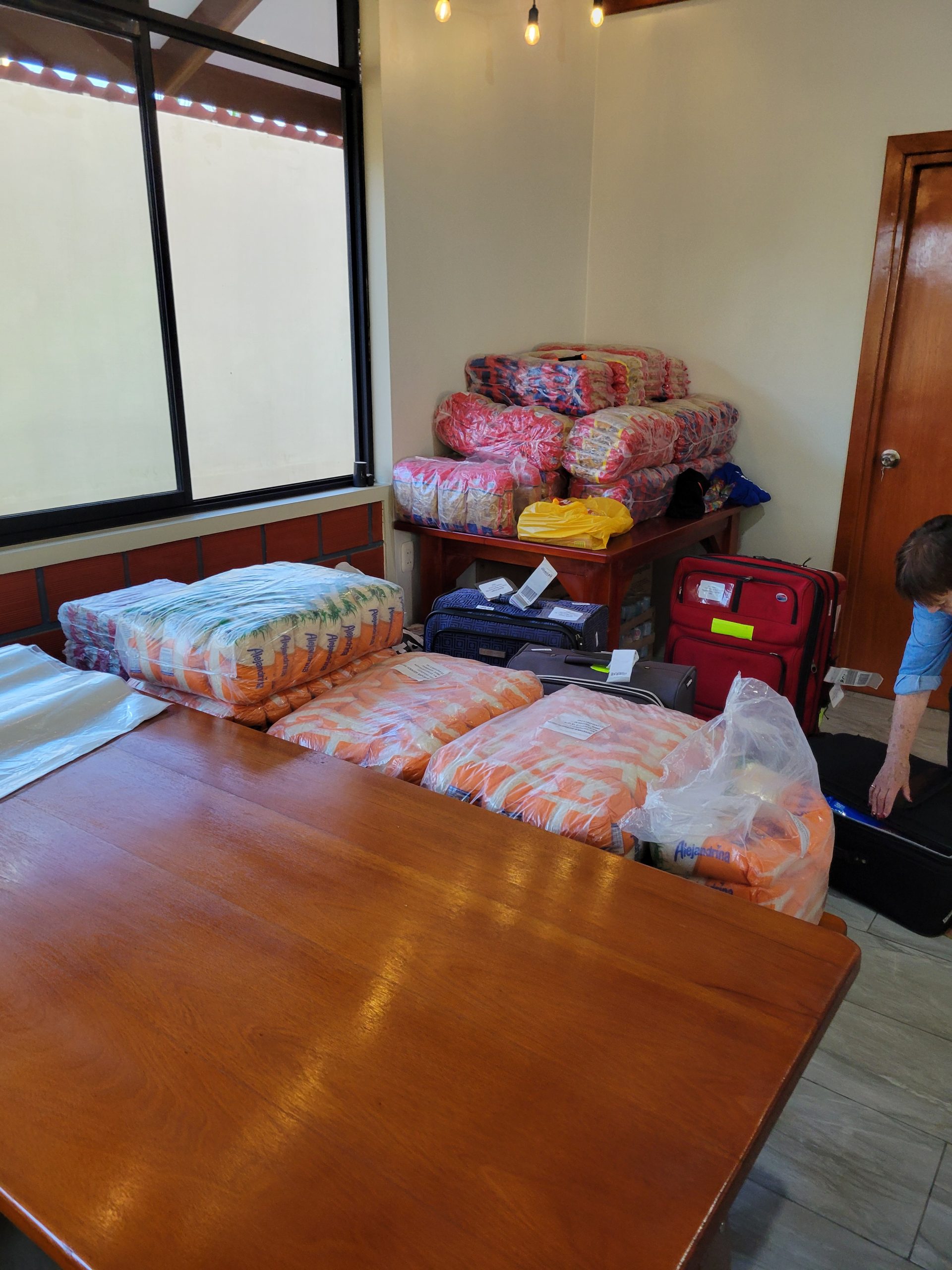 Pallets of food to pack up for distribution. 
