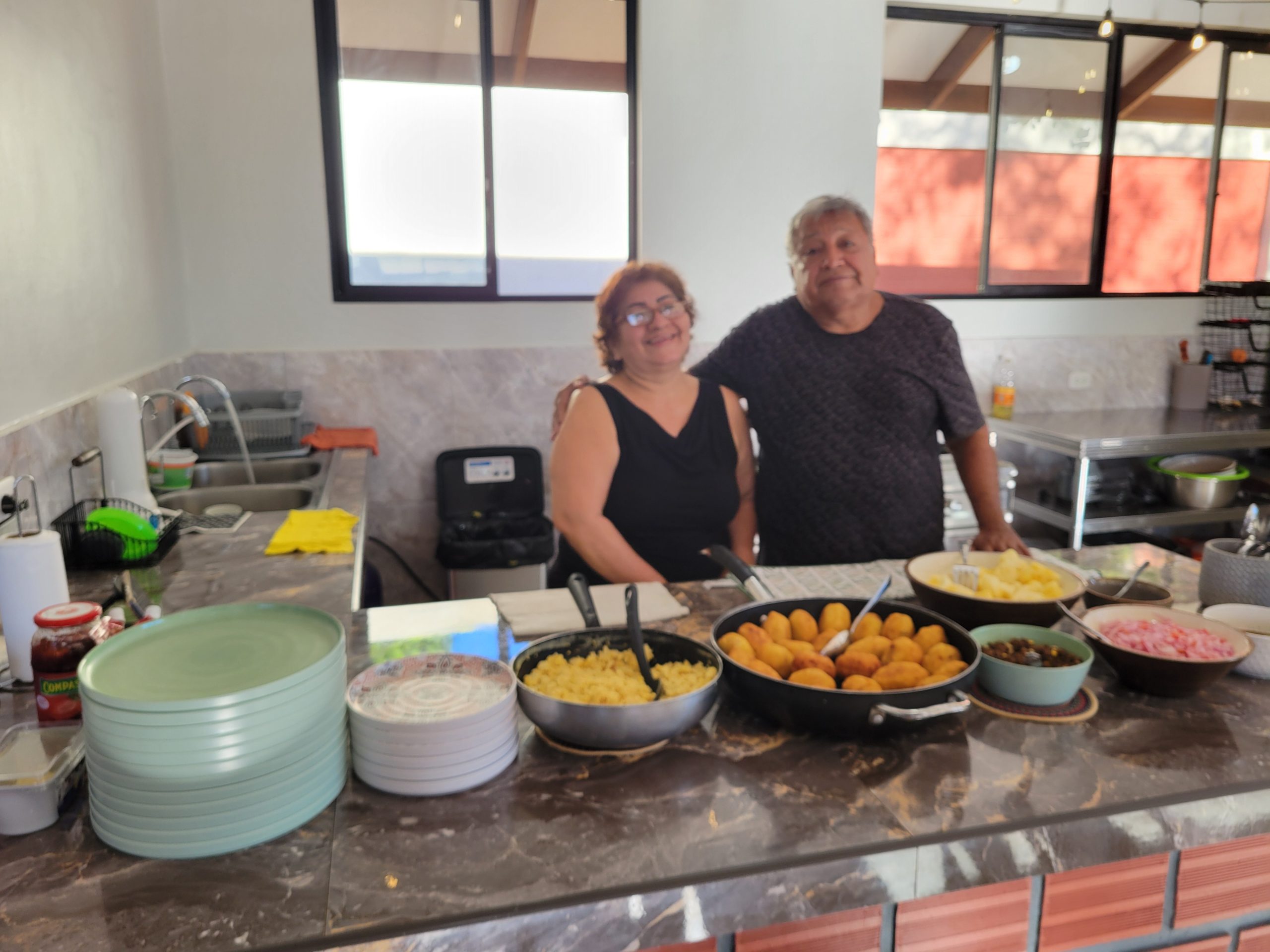 Gogo and Dolly serving the wonderful food they cooked us.