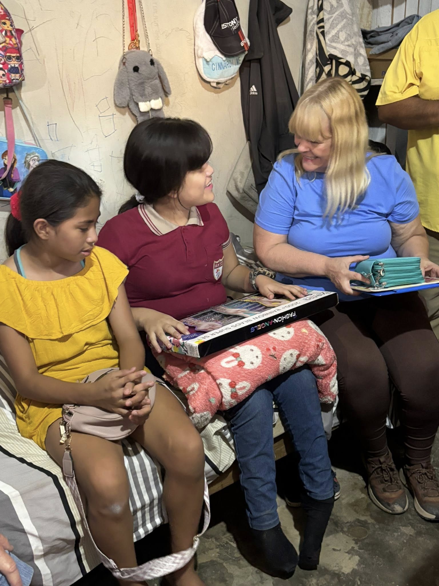 Giving gifts to Milagros.