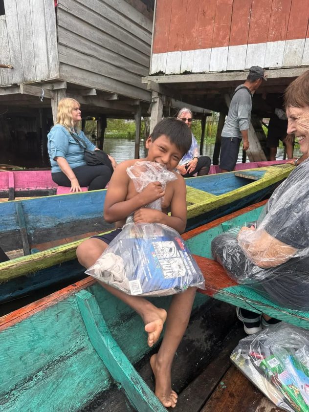 A child receiving goodies. 